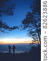 Silhouette couple with a beautifu mountain ridge and sky 82623886