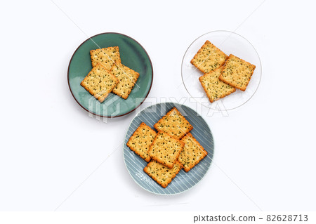 Seaweed crackers in plate on white background. Seaweed crackers in plate on white background. 82628713