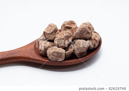 Dried salted Chinese plum isolated on white background 82628748
