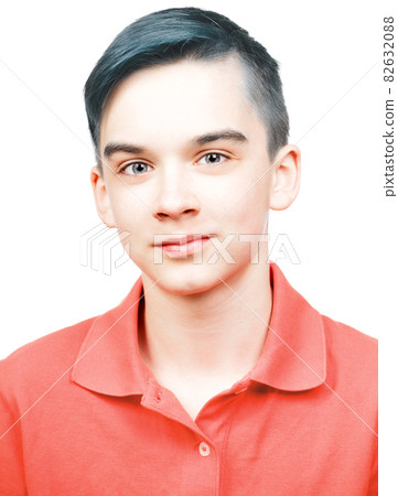 Teen boy wearing living coral trendy color polo shirt portrait isolated on white 82632088