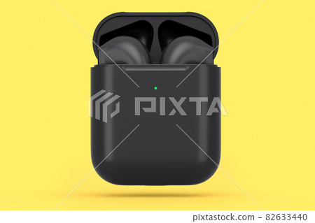 Wireless bluetooth headphones in black case isolated on yellow background 82633440
