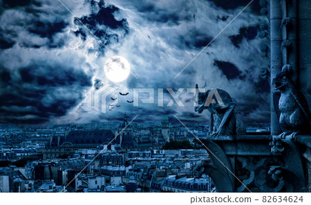 Paris at gothic night on Halloween, France. Fantasy panorama of creepy city and gargoyle . Paris at gothic night on Halloween, France. Fantasy panorama of creepy city and gargoyle . 82634624