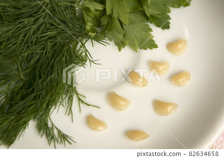 Miniature dumplings with greens 82634658