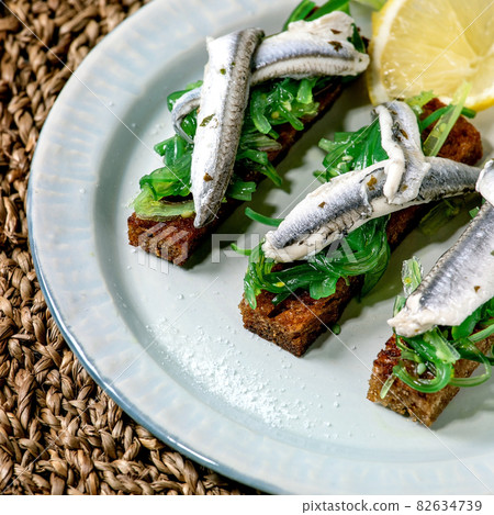 Appetizers tapas pickled anchovies or sardines fillet Appetizers tapas pickled anchovies or sardines fillet 82634739