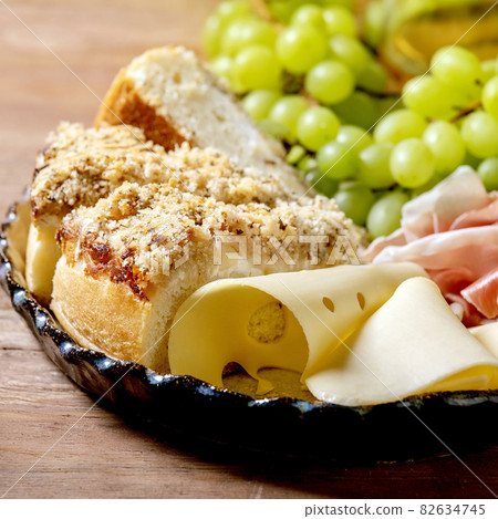 Appetizers antipasti with white sicilian focaccia and cheese Appetizers antipasti with white sicilian focaccia and cheese 82634745