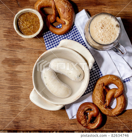 Munich Bavarian traditional white sausages in ceramic pan 82634746
