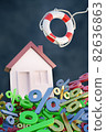 House among percent symbols with thrown lifebuoy 82636863