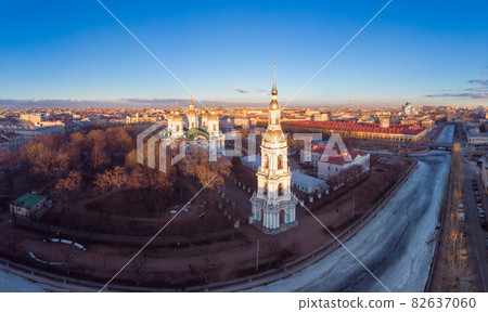 Aerial top view to St. Nicholas Naval Sea Cathedral in sunny day. Panorama of evening historical city center. Orthodox church located on banks of Kryukov and Griboyedov canal. Saint Petersburg. Russia Aerial top view to St. Nicholas Naval Sea Cathedral in sunny day. Panorama of evening historical city center. Orthodox church located on banks of Kryukov and Griboyedov canal. Saint Petersburg. Russia 82637060