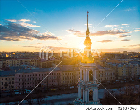 Aerial top view to St. Nicholas Naval Sea Cathedral in sunny day. Panorama of evening historical city center. Orthodox church located on banks of Kryukov and Griboyedov canal. Saint Petersburg. Russia Aerial top view to St. Nicholas Naval Sea Cathedral in sunny day. Panorama of evening historical city center. Orthodox church located on banks of Kryukov and Griboyedov canal. Saint Petersburg. Russia 82637066