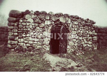 Entrance to the basement in a brick wall in the Novogrudok castle in Belarus 82643774