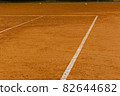 Corner of the ground tennis court with white lines 82644682