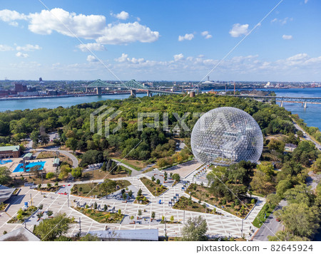 Aerial view of Montreal Biosphere in summer sunny day. Jean-Drapeau park, Saint Helens Island. A museum dedicated to the environment. Aerial view of Montreal Biosphere in summer sunny day. Jean-Drapeau park, Saint Helens Island. A museum dedicated to the environment. 82645924