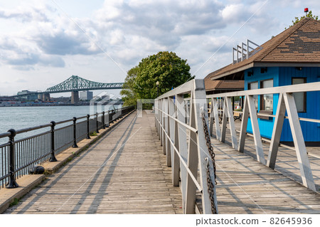 Jean-Drapeau park maritime shuttle landing stage. Saint Helens Island in sunset time. Montreal, Quebec, Canada. 82645936