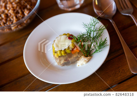 Meat galantine with vegetables, popular russian dish 82648318