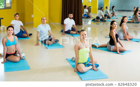 happy people relaxing and enjoying yoga elements happy people relaxing and enjoying yoga elements 82648320
