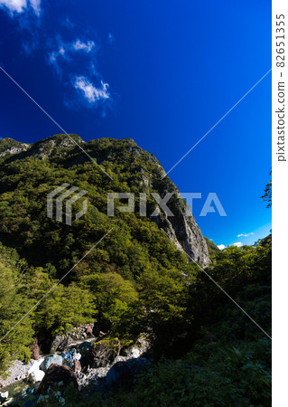 Mt. Myojo, a rock wall towering in front of you Mt. Myojo, a rock wall towering in front of you 82651355