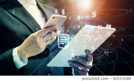 Women who use smartphones and tablets IoT ICT 82651686