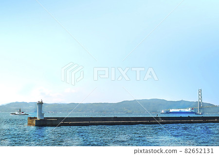 Ships navigating the Akashi Strait Awaji Island and the blue sky background 82652131
