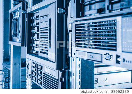 Cluster of data storage hard drives inside server room Cluster of data storage hard drives inside server room 82662389