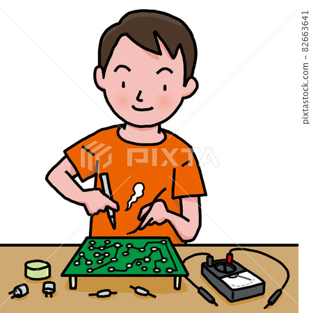 A boy who solders to the base by electronic work A boy who solders to the base by electronic work 82663641