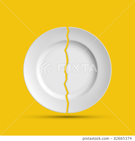 White porcelain plate is broken into two pieces White porcelain plate is broken into two pieces 82665374