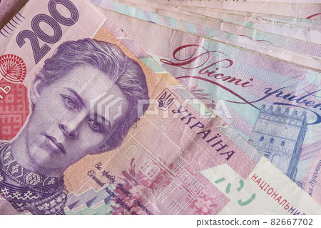 A bunch of banknotes with a face value of two hundred hryvnias. Ukrainian money. 82667702
