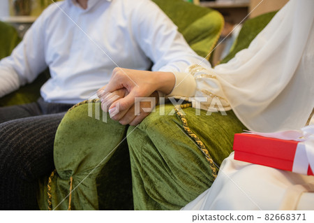 National wedding. Bride and groom. Wedding muslim couple during the marriage ceremony. Muslim marriage. National wedding. Bride and groom. Wedding muslim couple during the marriage ceremony. Muslim marriage. 82668371