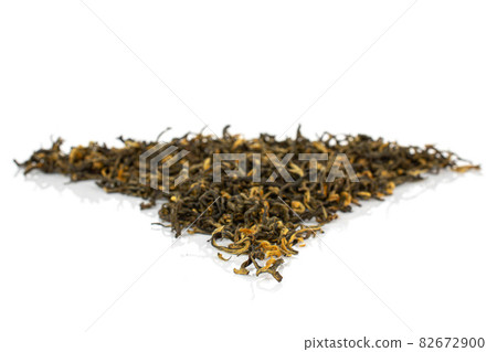 Dry tea leaves on white 82672900
