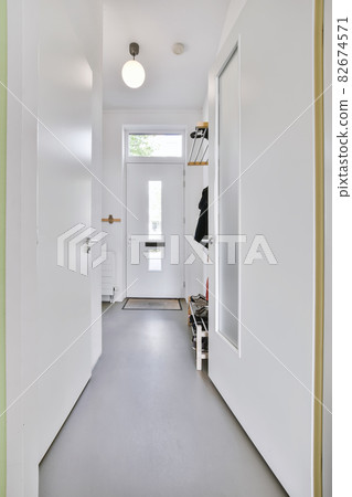 Designed in a minimalistic style long corridor 82674571