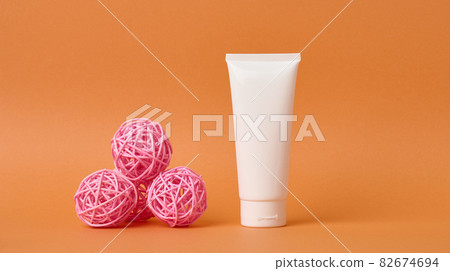 empty white plastic tubes for cosmetics. Packaging for cream, gel, serum, advertising and product promotion, mock up empty white plastic tubes for cosmetics. Packaging for cream, gel, serum, advertising and product promotion, mock up 82674694