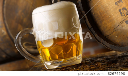 frothy beer mug in the cellar frothy beer mug in the cellar 82676298