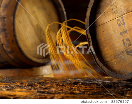 setting with beer barrels in the cellar 82676307