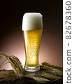 poured fresh frothy beer mug 82678360