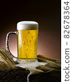 poured fresh frothy beer mug 82678364