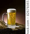 poured fresh frothy beer mug 82678365