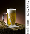 poured fresh frothy beer mug 82678367