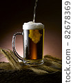 poured fresh frothy beer mug 82678369