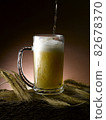 poured fresh frothy beer mug 82678370