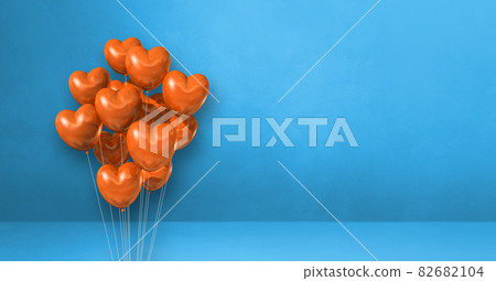 Orange heart shape balloons bunch on a blue wall background. Horizontal banner. 82682104