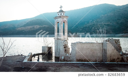 Ruined old church in Alassa, Cyprus is submerged under the water of Kouris dam 82683659