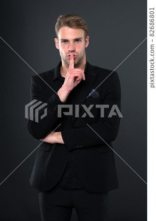 Man elegant manager wear black formal outfit on dark Man elegant manager wear black formal outfit on dark 82686801