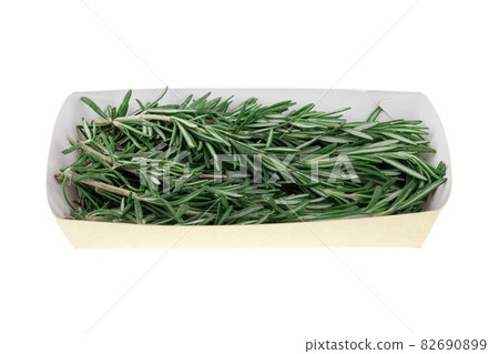Rosemary on a white background. Rosemary in the package close-up. 82690899