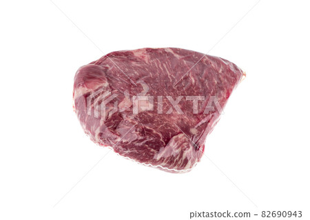 Vacuum packed meat on a white background. Close-up of beef in a vacuum bag. 82690943