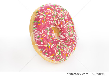 Donut close-up on a white background. Round donut isolated on white background. Donut close-up on a white background. Round donut isolated on white background. 82690982