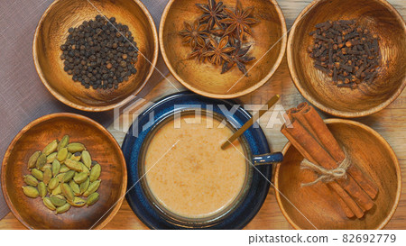 Chai tea and spices Cinnamon, cardamom, cloves, pepper and star anise 82692779