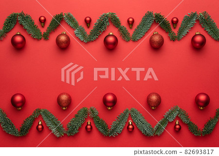 Christmas ornament on a red background with copy space Christmas ornament on a red background with copy space 82693817
