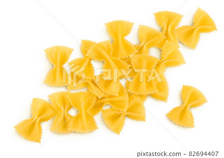 Bow tie pasta isolated on white background with clipping path and full depth of field. Top view. Flat lay. Bow tie pasta isolated on white background with clipping path and full depth of field. Top view. Flat lay. 82694407