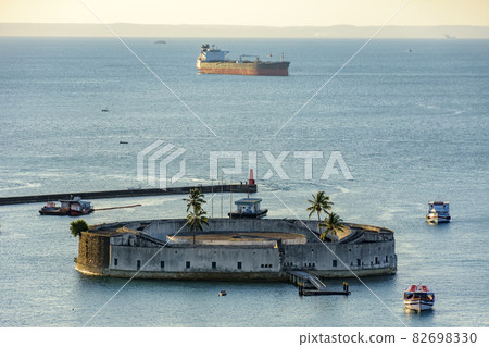 Fortress surrounded by the waters of the Salvador sea at dusk 82698330