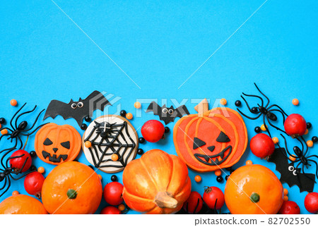Halloween background with cookies, spiders and bats, top view 82702550