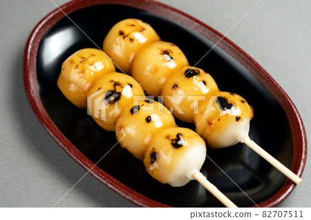 Freshly made and delicious Mitarashi dumplings Freshly made and delicious Mitarashi dumplings 82707511